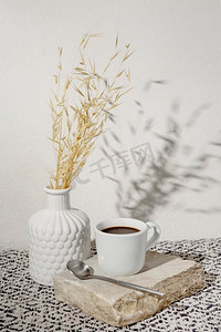 麦花摄影照片_盛有干麦杯咖啡的花瓶