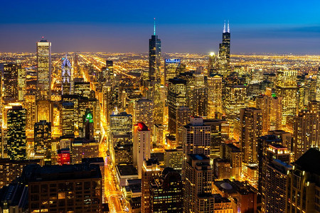 伊利奶粉摄影照片_鸟瞰图芝加哥天际线大楼在芝加哥市中心在伊利诺伊州芝加哥市的美国。看向芝加哥南部。
