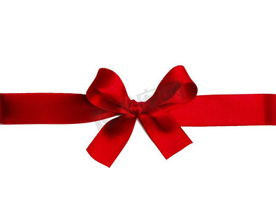党丝绸摄影照片_闪亮的红缎丝带和弓隔绝在白色背景。节日礼物的概念。闪亮的红缎丝带蝴蝶结