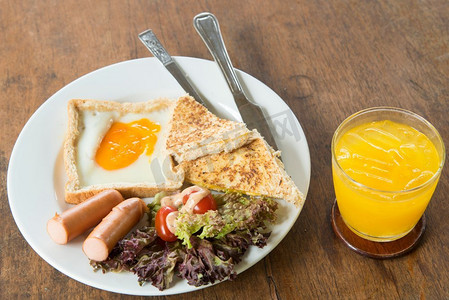 橙汁摄影照片_带橙汁的早餐