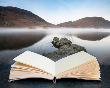 数字合成令人惊叹的秋季景观图像crummock水在日出在湖区英格兰在打开的书页