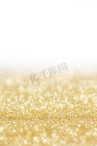 闪亮的金bokeh闪光的光抽象背景，圣诞节新年聚会庆祝概念。闪亮的金色灯光背景