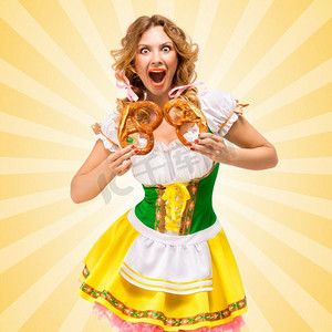 快乐，兴奋，性感的啤酒节女人穿着传统的巴伐利亚连衣裙，拿着两个椒盐卷饼，五颜六色的抽象卡通风格的背景。