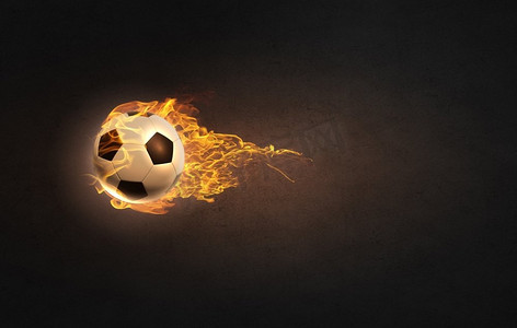 热球。火光中的足球概念形象