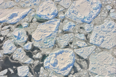 春季旅行摄影照片_春季格陵兰岛上空的冰川融化