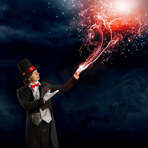 戴帽子的魔术师形象的向导在红色领结显示技巧
