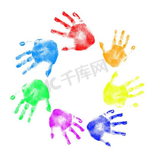 拇指拇指摄影照片_白色背景上不同位置的不同颜色的手印。