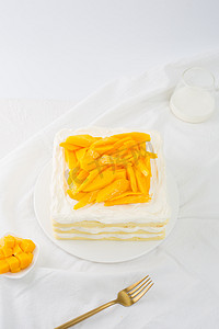 蛋糕店摄影照片_芒果蛋糕糕点精致甜品蛋糕店烘焙生日多层夹心