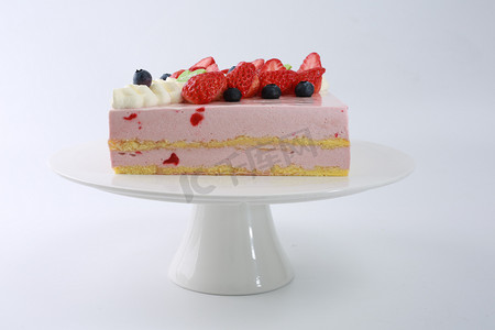 蛋糕店摄影照片_蛋糕糕点生日夹心奶油甜品蛋糕店烘焙草莓鲜果多层