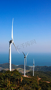 智慧监管暖色调摄影照片_风电风能风车新能源
