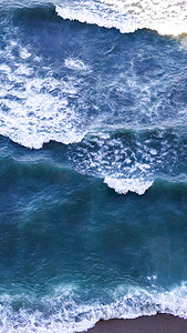 海滩浪花摄影照片_海滩大海沙滩浪花