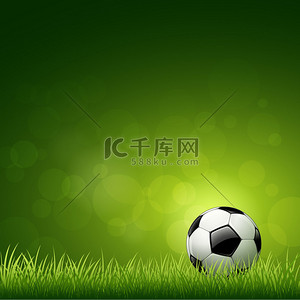 足球背景图片_足球球设计上绿草背景