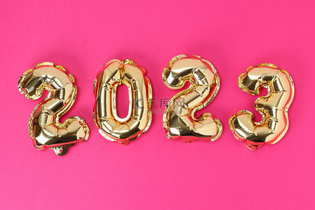 新年new背景图片_2023年新年。粉色背景的2023号气球。新年及圣诞.