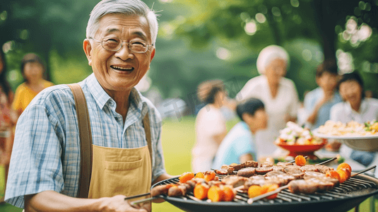 烧烤狂欢季摄影照片_快乐的老年亚洲朋友烧烤烧烤聚会在公园老人会议