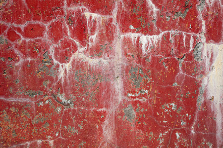 红色脏裂墙面带污渍的背景