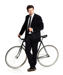 企业经典摄影照片_穿着经典西装、白色自行车的帅哥