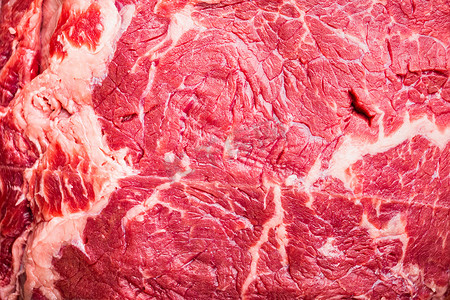里脊肉摄影照片_带状牛排，大理石纹牛肉，顶视图