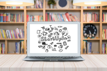 智能现代笔记本电脑，在 Co Working Space 的屏幕上涂鸦，为创业企业家和自由职业者提供新的办公风格。