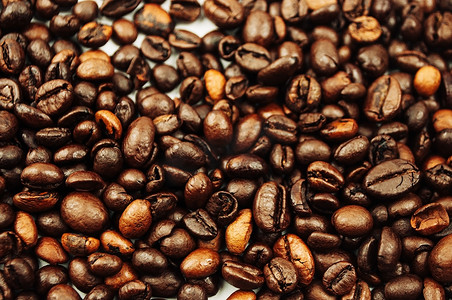 不同类型的烘焙咖啡豆纹理背景。