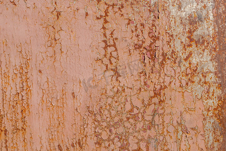 生锈的铁表面有旧油漆的残余，剥落的油漆，米黄纹理，背景
