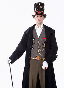 魔术师摄影照片_戴高帽、长大衣和时钟零件细节的魔术师