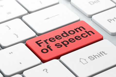 言论自由摄影照片_政治概念： 计算机键盘背景上的言论自由