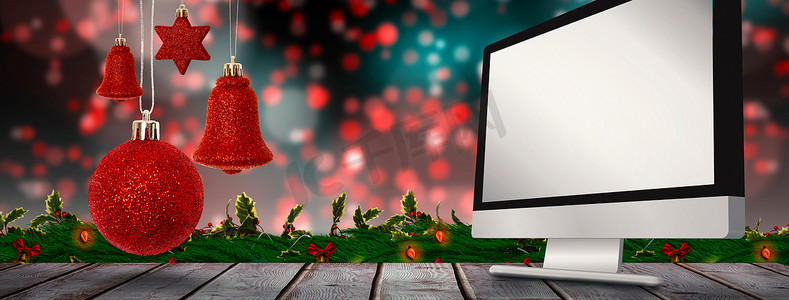 红色圣诞铃铛装饰悬挂的合成图像
