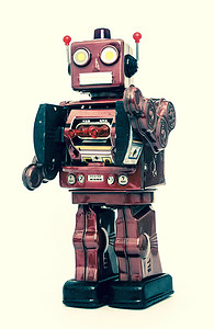站立的机器人摄影照片_金属机器人玩具站立