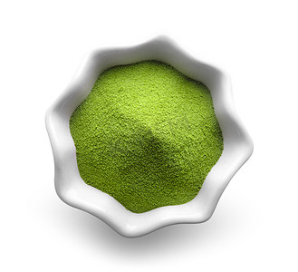 白色背景中碗中的绿茶粉