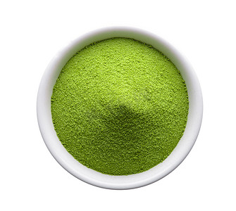 绿茶粉摄影照片_白色背景中碗中的绿茶粉