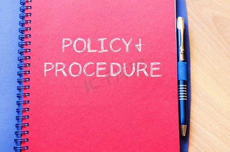 分类目录摄影照片_政策和程序写在笔记本上