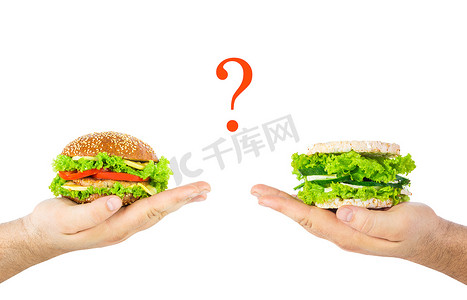 蔬菜饼汉堡摄影照片_有害的垃圾食品或天然保健食品