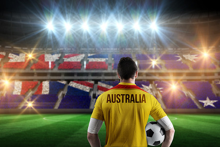块状摄影照片_澳大利亚足球运动员持球的复合图像