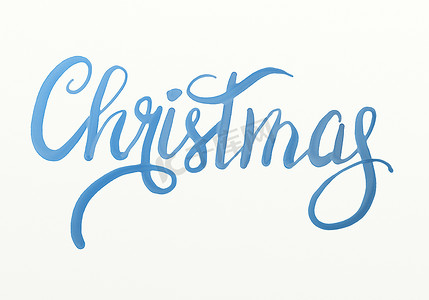 冬天海报摄影照片_圣诞快乐手绘蓝色水彩刻字