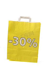 有 30% 折扣的黄色购物袋