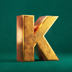 福字摄影照片_潮水绿色背景上的 Fortuna 金色字母 K 大写。
