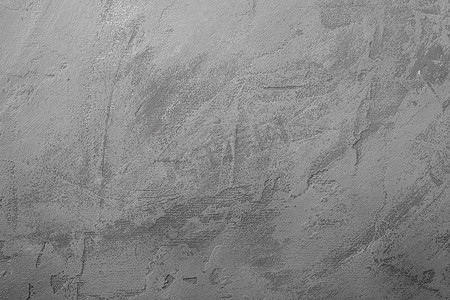 水泥地摄影照片_灰色水泥石织地不很细背景，黑暗的混凝土表面
