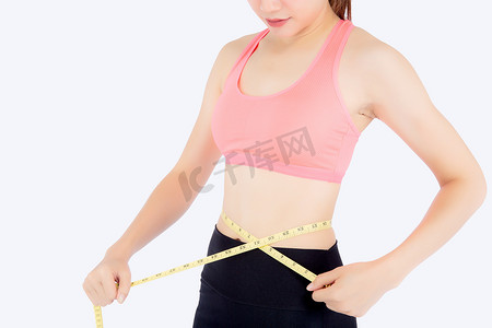 瘦腰摄影照片_美丽苗条的年轻亚洲女性测量带细腰穿
