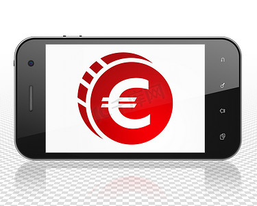 货币概念：有欧元硬币的智能手机在显示