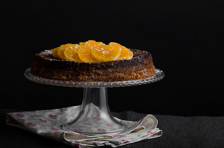 蛋糕蜂蜜摄影照片_蜂蜜橙子蛋糕