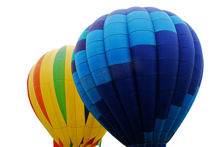 黄色的热气球图案摄影照片_飞行的热气球