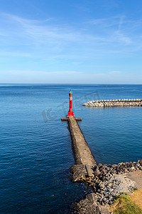 灯塔大海摄影照片_印度尼西亚万鸦老市的灯塔