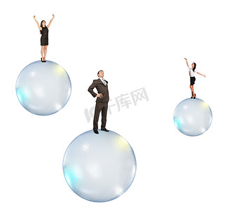 商务气泡摄影照片_一群商务人士乘着泡泡飞翔