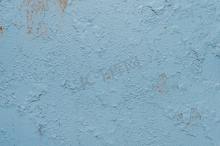 用旧的、破旧的金属风化铁质地粗糙背景脏钢的蓝色剥落油漆