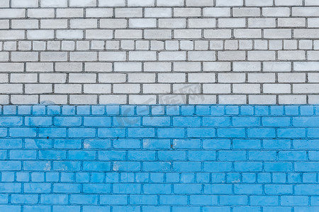 旧白砖墙漆成蓝色油漆城市设计背景纹理