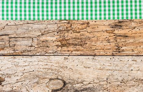 复古木桌面背景纹理，带质朴的绿色桌布