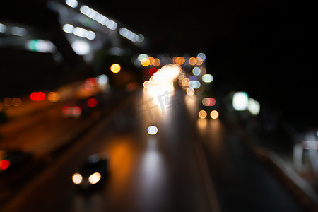 路灯博上的夜市抽象模糊交通城市