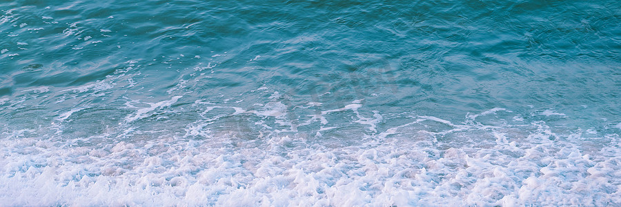 抽象自然背景海起波纹的水表面纹理边缘墙纸白色泡沫蓝色绿色绿松石