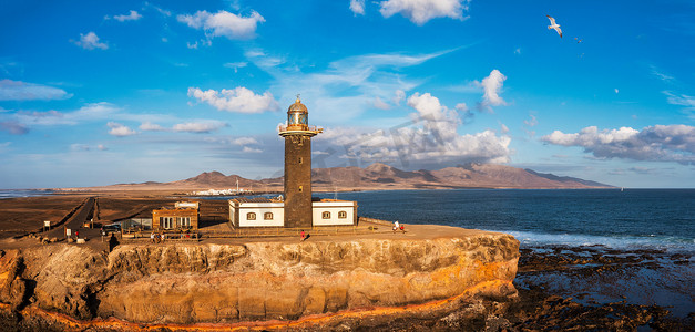 Punta de Jandia 灯塔从上面，空中蓝色海，费埃特文图拉岛，加那利群岛，西班牙。