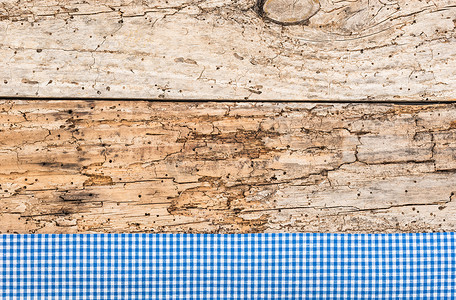 复古木桌面背景纹理，带质朴的蓝色桌布